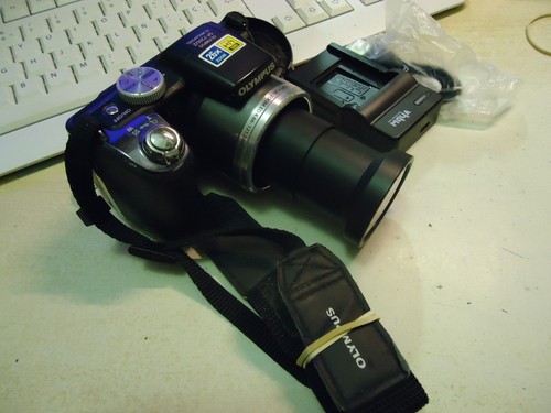 Olympus 720uz mp cmos - sp,